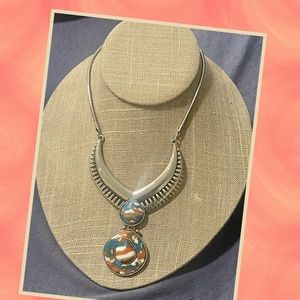 Silver and neutral pendant necklace